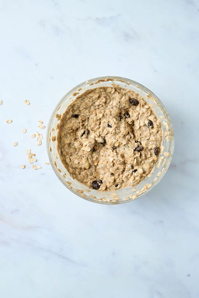 oat mixture in a glass mixing bowl.