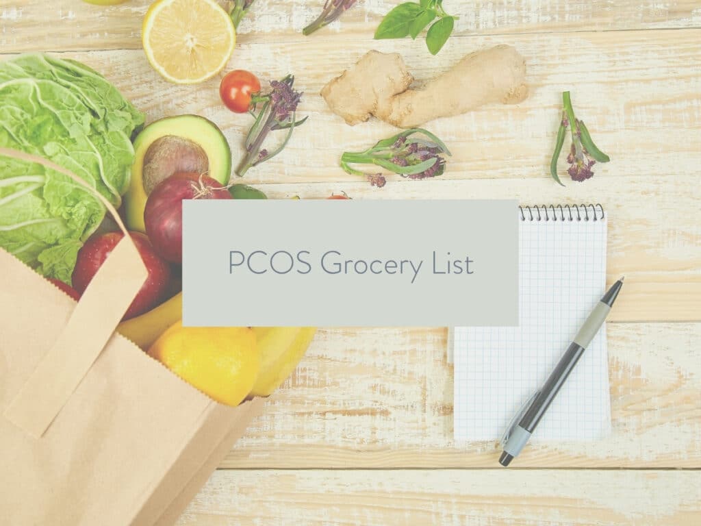 groceries on a wood countertop with a shopping list next to it; text overlay states: PCOS Grocery list.
