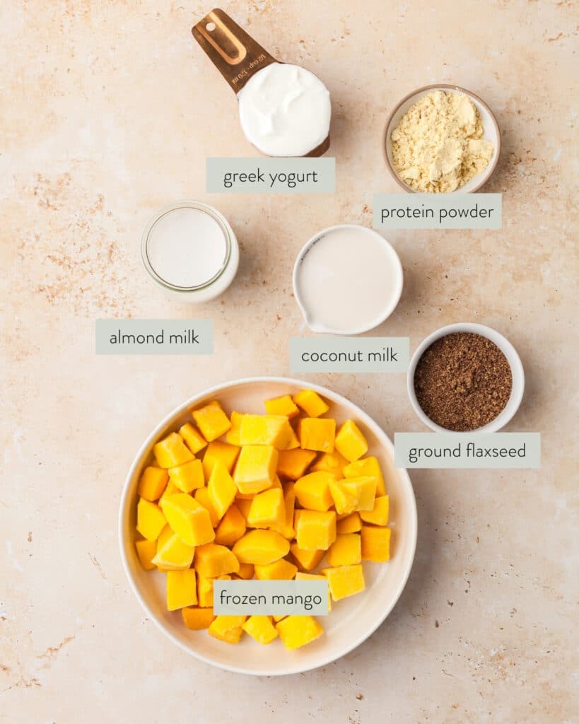 ingredients needed to make a mango protein smoothie recipe.
