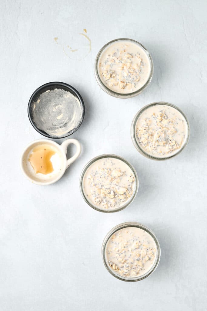 overhead view of pcos friendly overnight oats in jars.