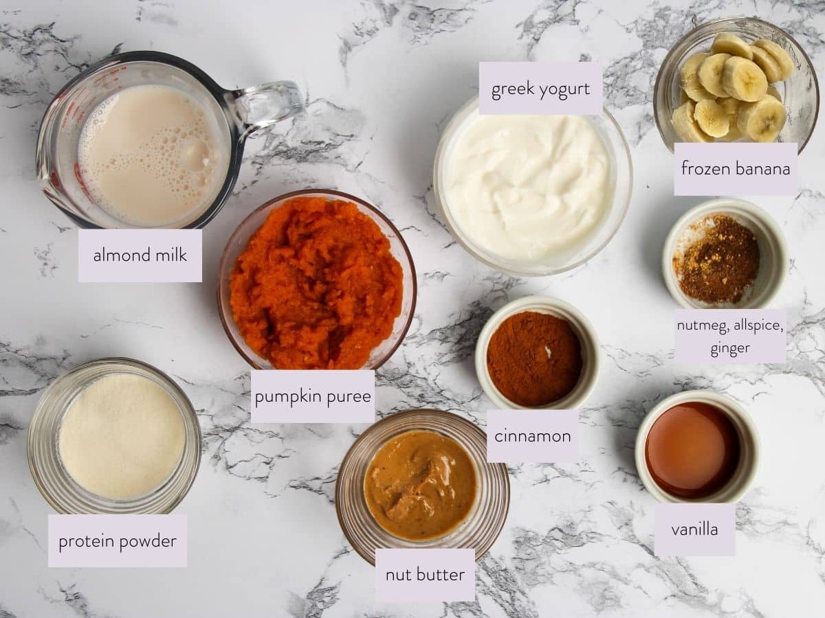 photo of all ingredients necessary to make a healthy pumpkin smoothie in small bowls