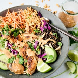 crispy rice bowl recipe in a gray colored bowl.