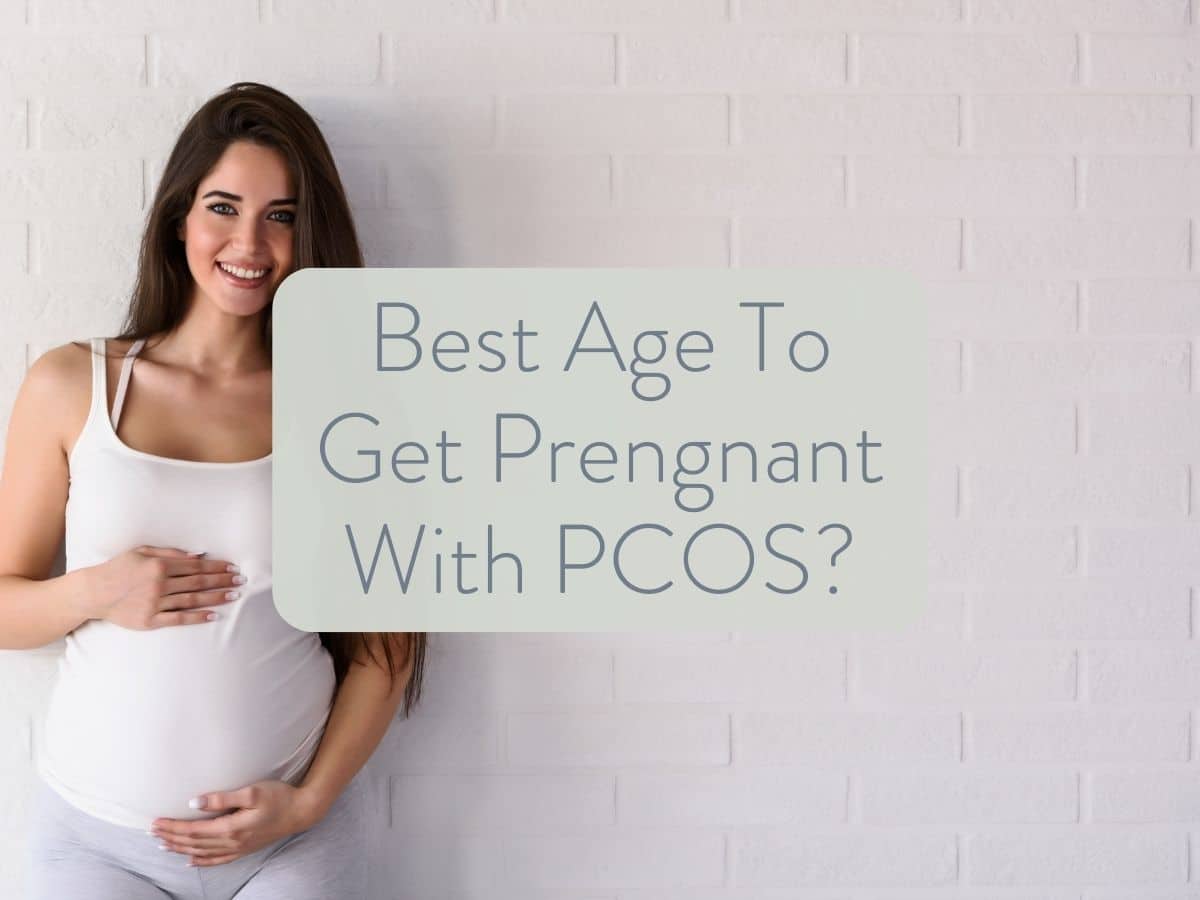 photo of a pregnant woman holding her pregnant belly while smiling; the text overlay states best age to get pregnant with pcos.