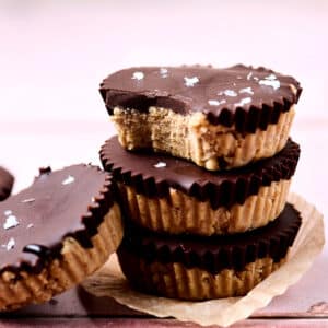 peanut butter chocolate cups stacked on top of each other.