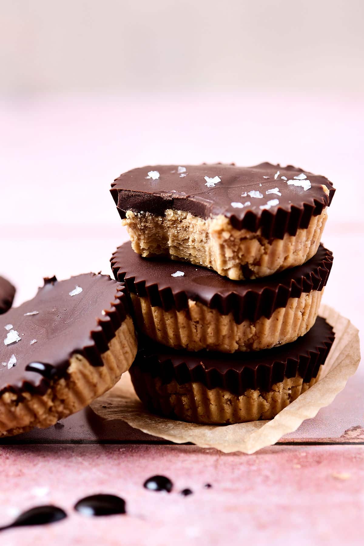 peanut butter chocolate cups stacked on top of each other.