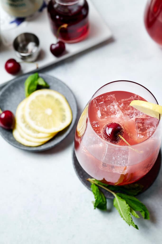 overhead view of a sleepy girl mocktail in a stemless wine glass.