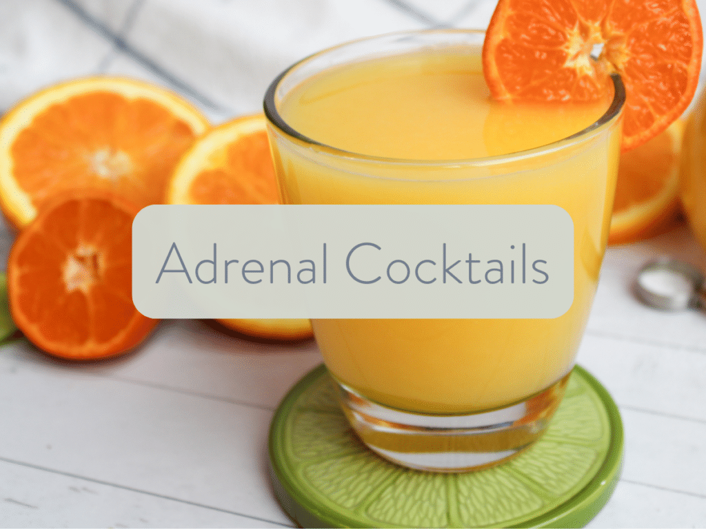 cup of orange juice with some deacorative citrus fruit.