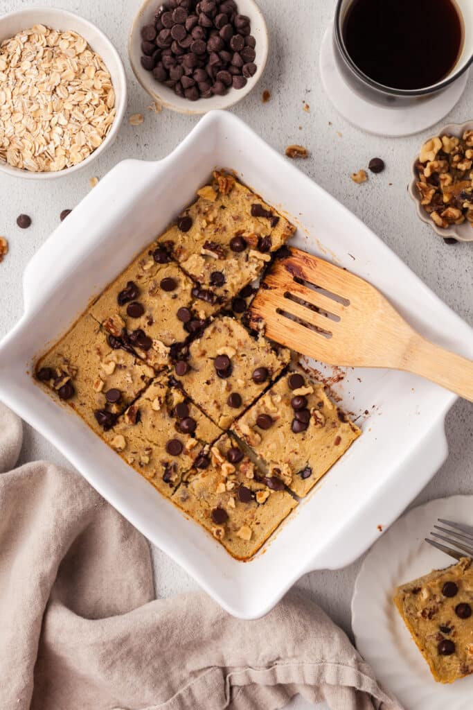 high protein baked oats in a white baking dish.