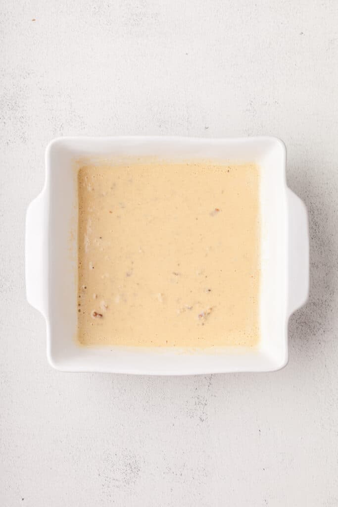 baked oats batter in a baking dish.