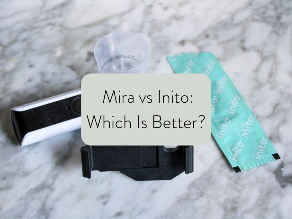 inito fertility monitor on a countertop; text overlay states mira vs inito: which is better?