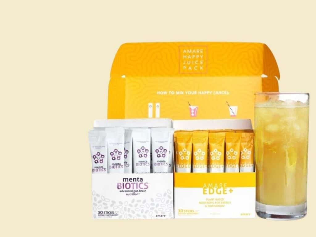 amare happy juice pack with a glass of orange-colored liquid.