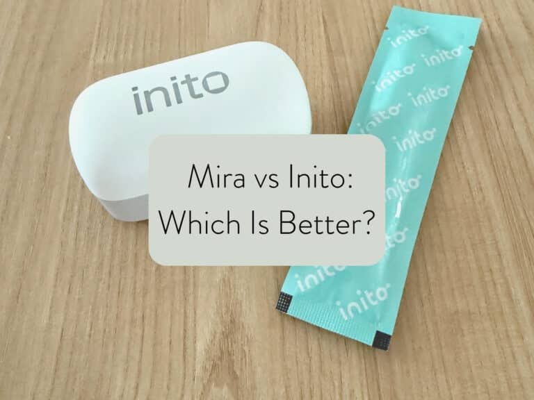 inito fertility monitor on a countertop; text overlay states mira vs inito: which is better?