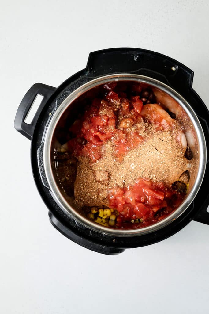 southwest chicken ingredients in a crockpot.