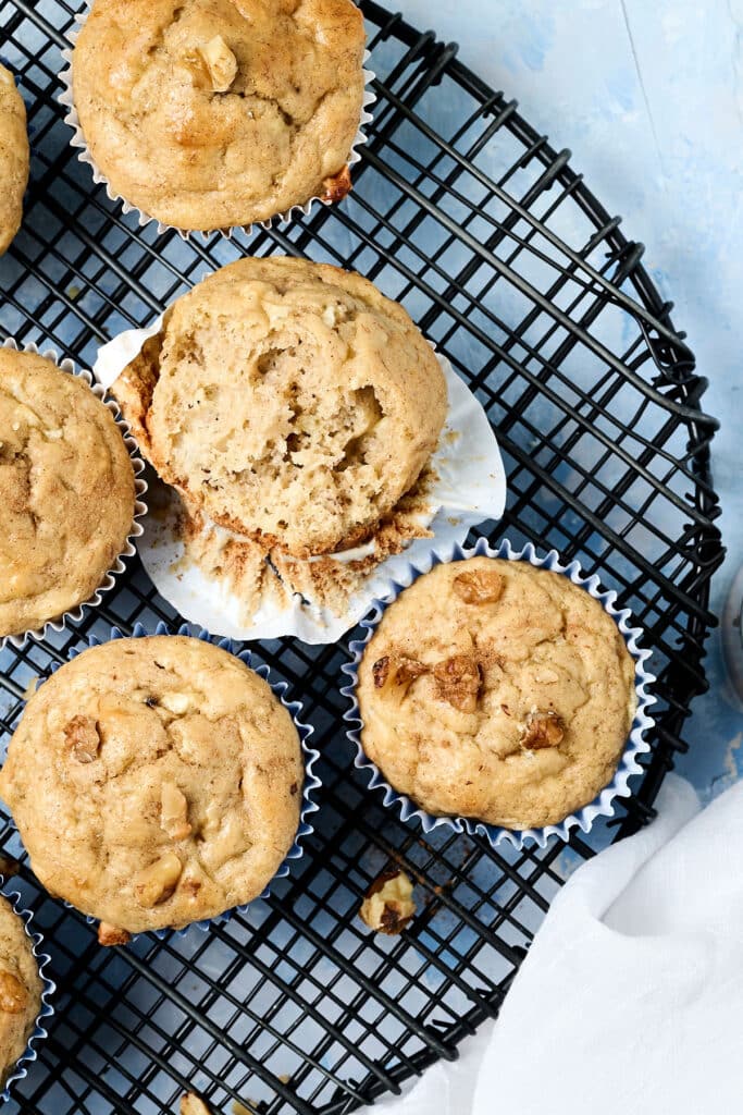 overhead view of banana cottage cheese muffins on wire rack.