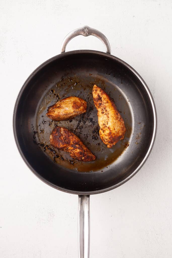 southwest chicken being cooked in a frying pan.