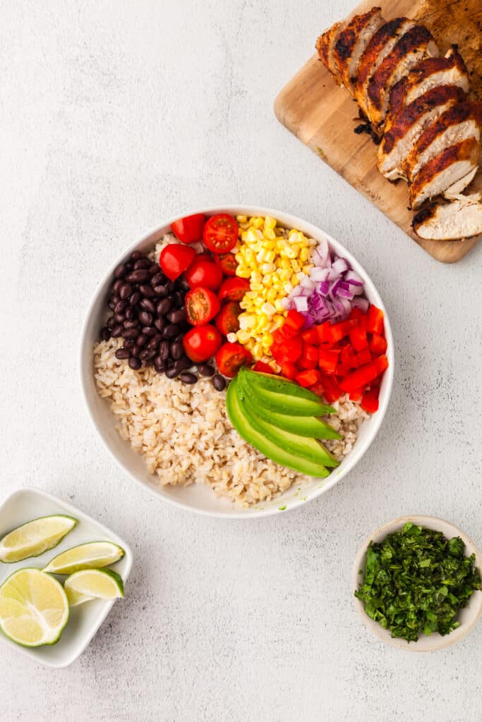 southwest chicken bowls being assembled.