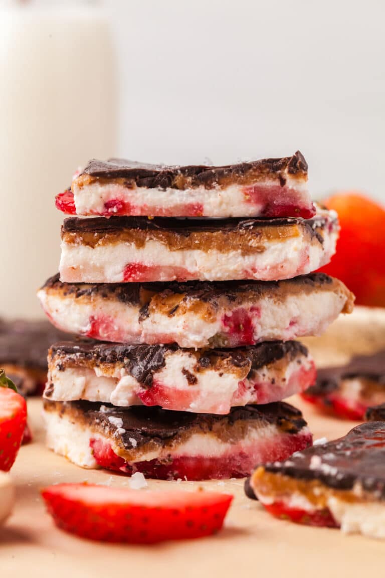 frozen cottage cheese bark pieces stacked on top of each other.