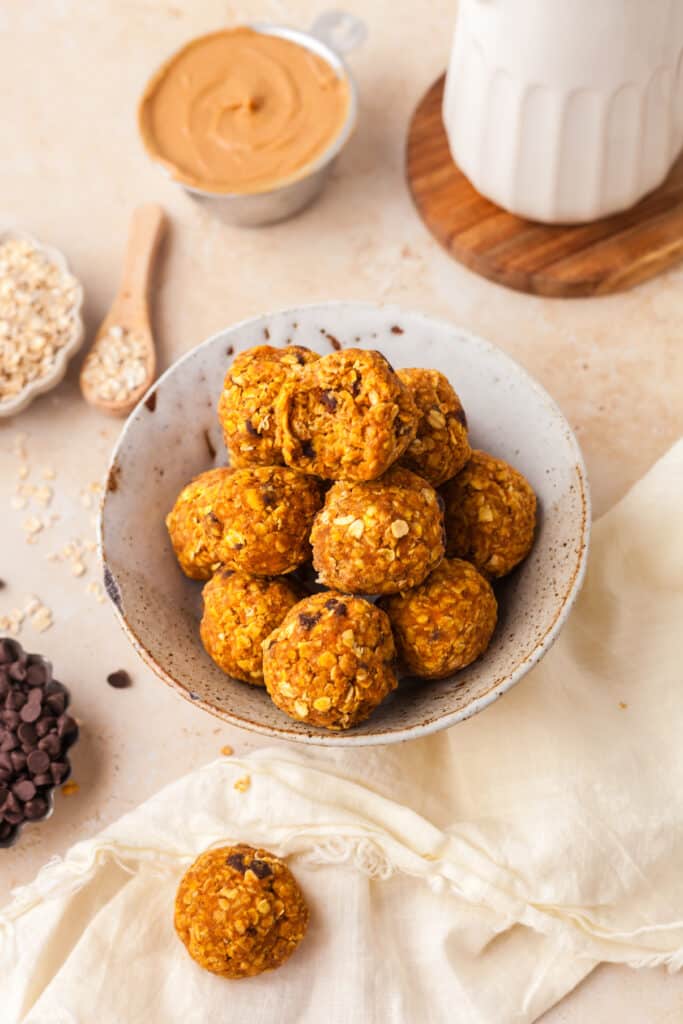 pumpkin protein balls in a glass bowl.