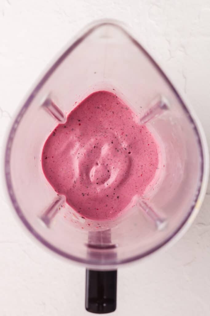 berry smoothie blended in a blender.
