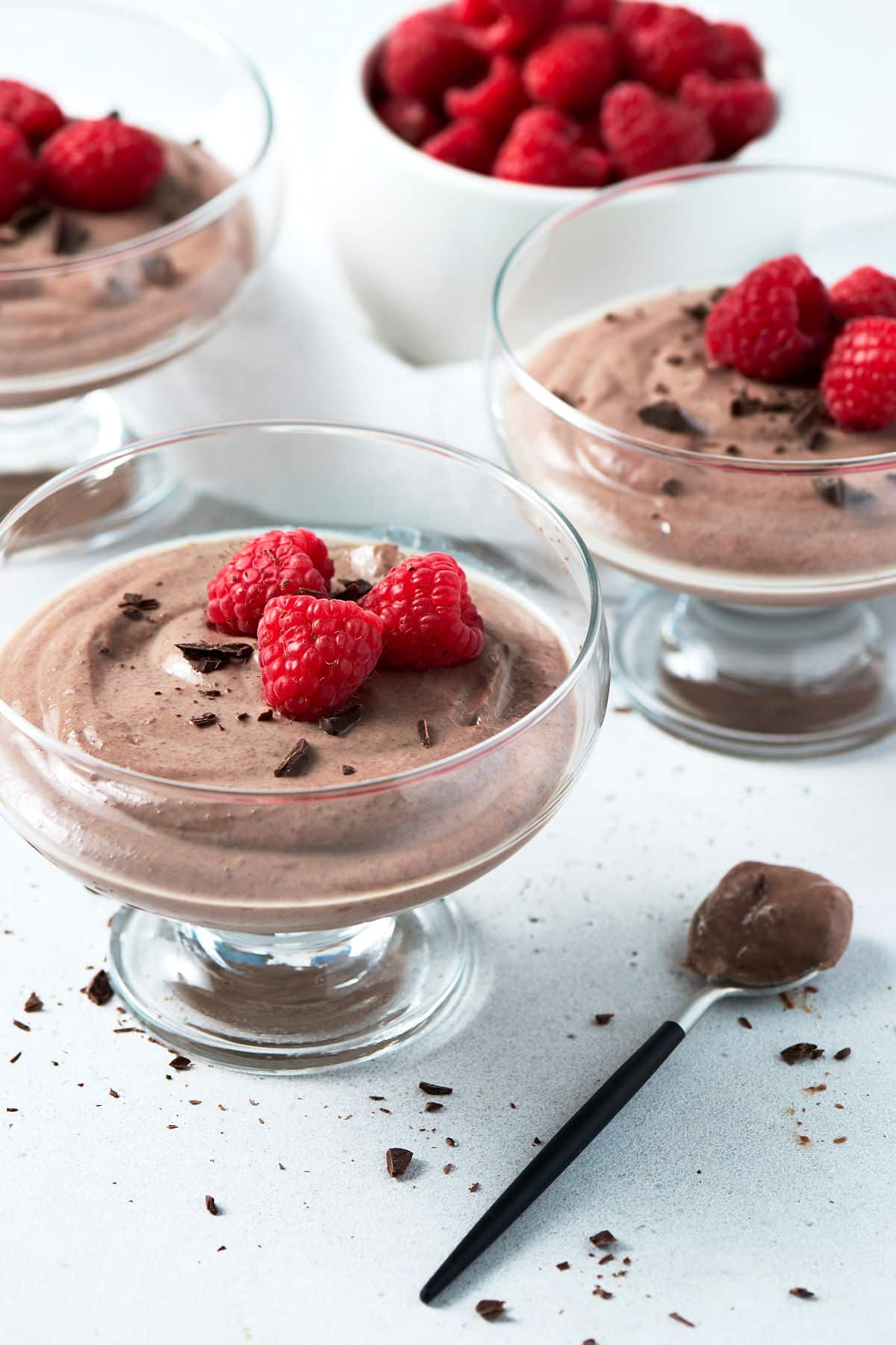 silken tofu chocolate mousse in a glass dessert cup with berries.