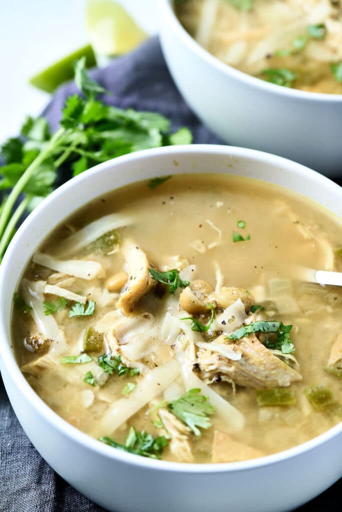 white chicken chili in a white bowl.
