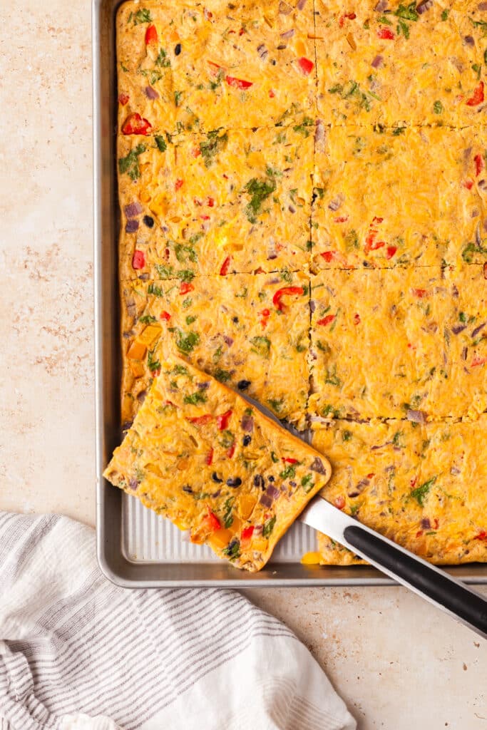 sheet pan burrito eggs with a slice cut out.