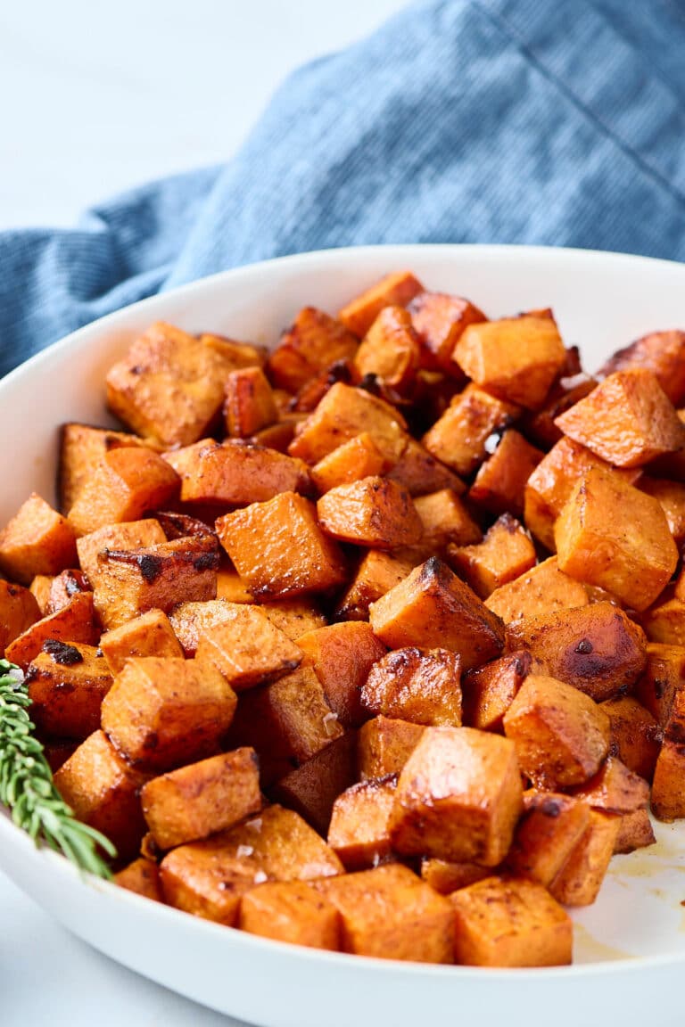 roasted pcos sweet potatoes in white bowl.