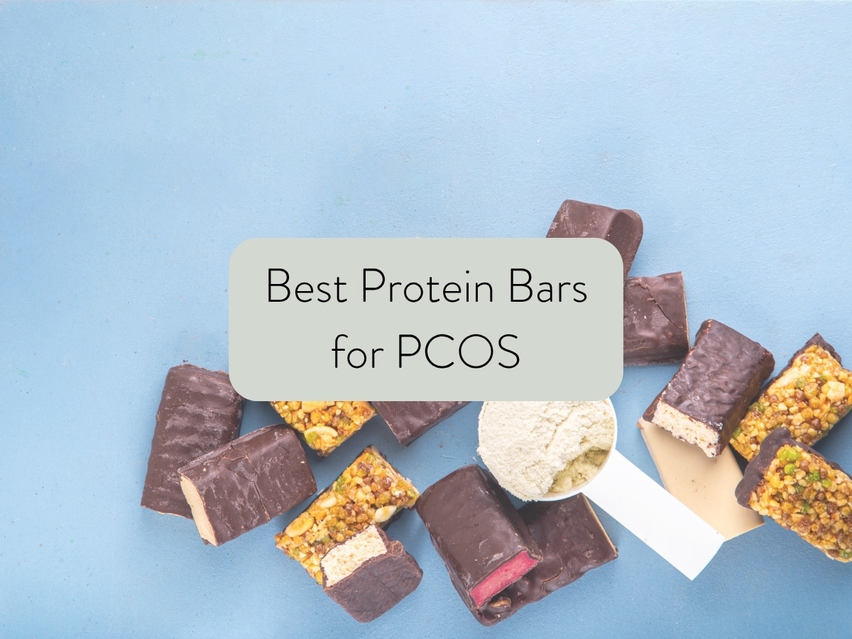 different protein bars in the background with text overlay stating: best protein bars for pcos.