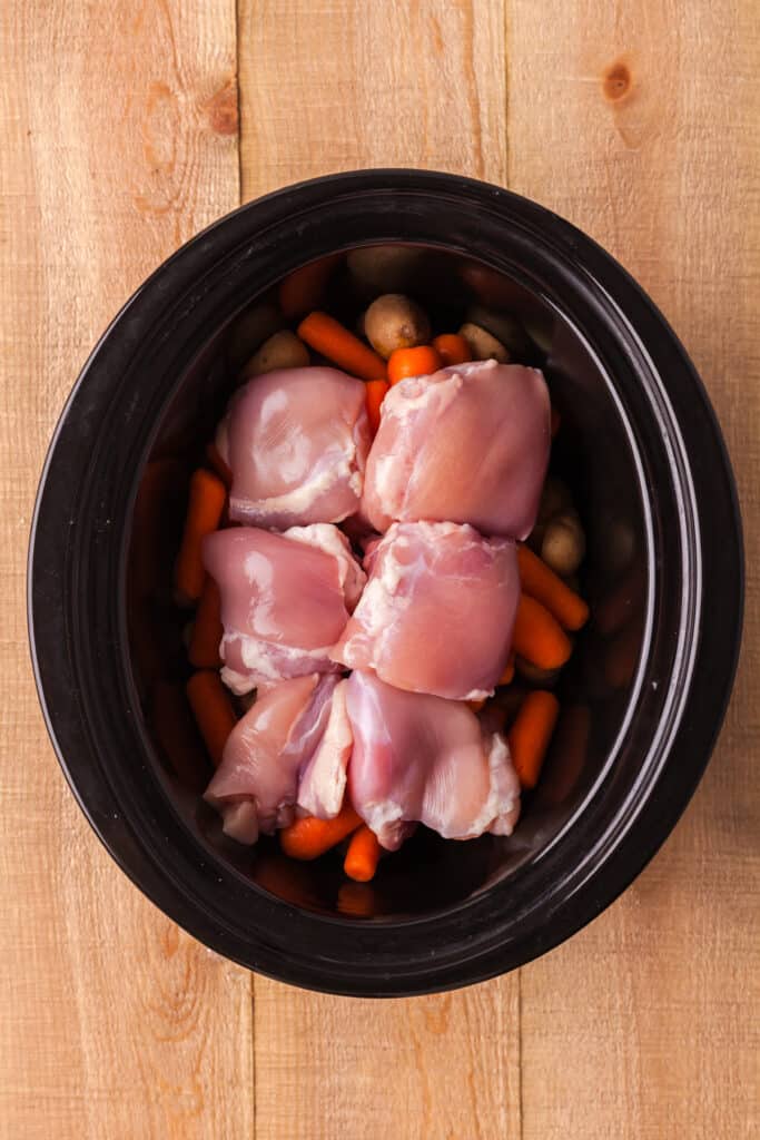 process shot for crockpot chicken potatoes and veggies recipe.