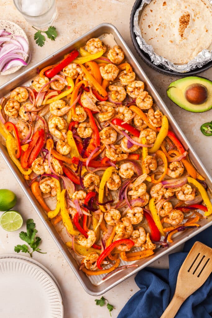sheet pan shrimp fajitas after they went into the oven.