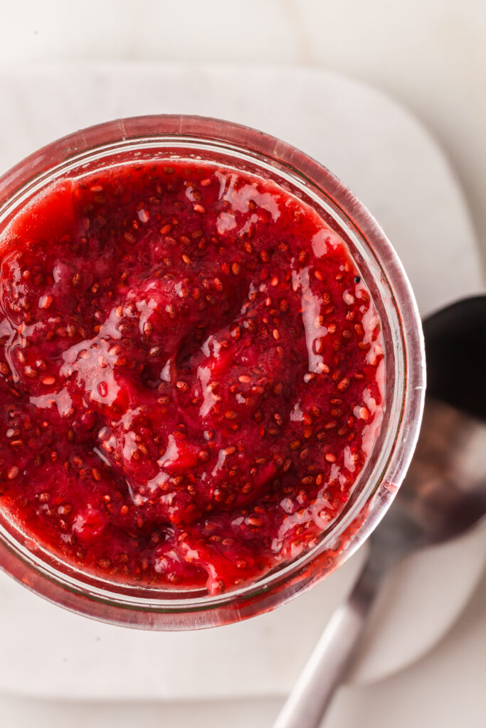 overhead view of chia seed jam in a jar.