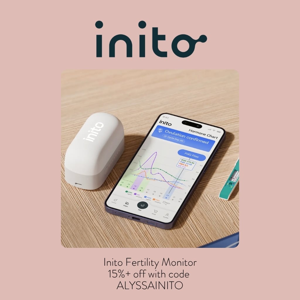 inito fertility monitor on counter with smartphone open; text indicates inito discount code.